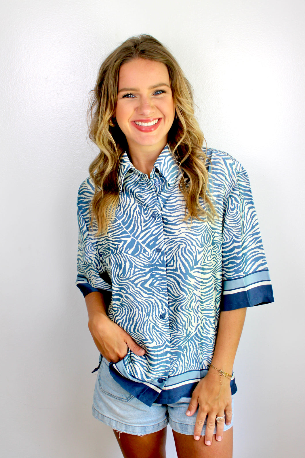 Blue zebra button top