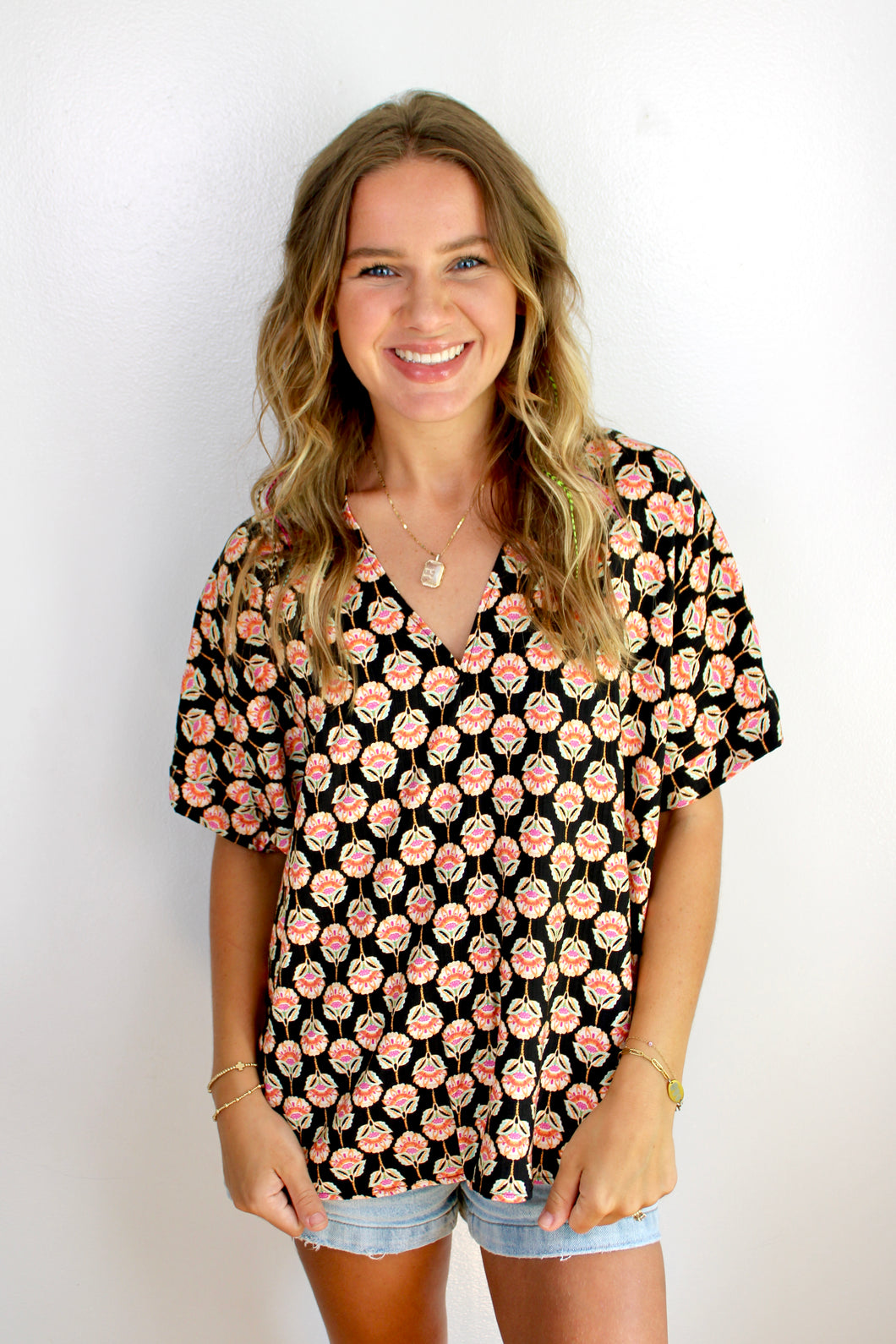 Black floral dolman sleeve top