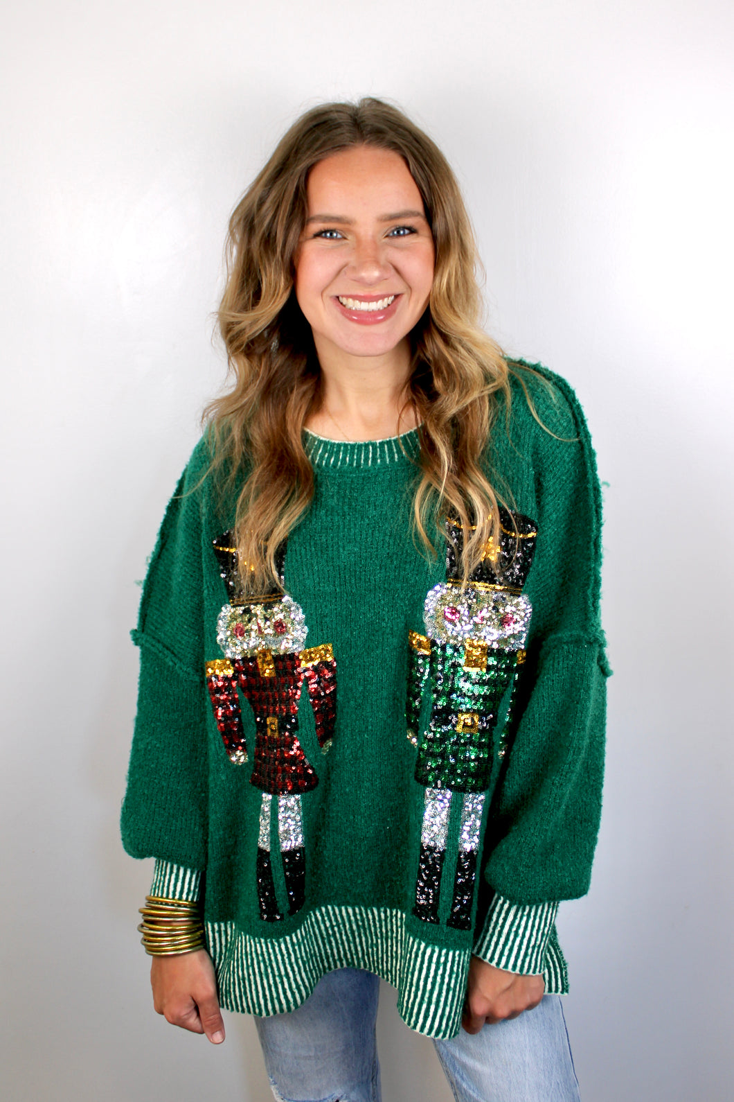 Green nutcracker sweater
