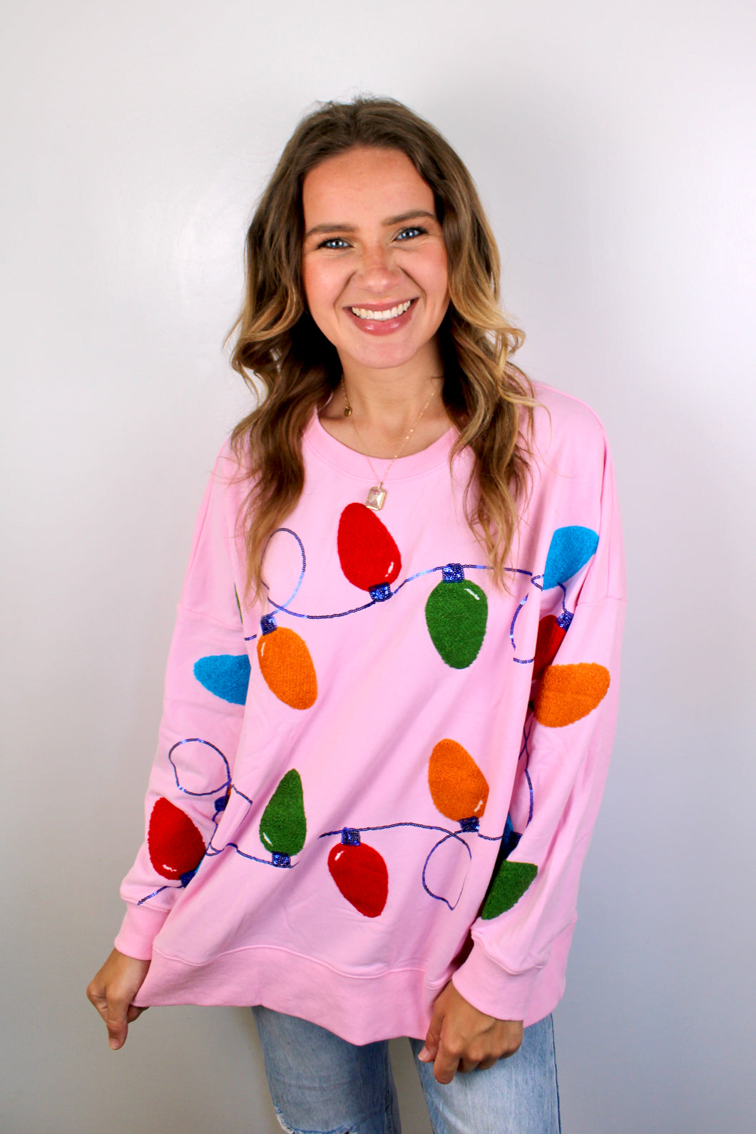 Pink Christmas light sweater