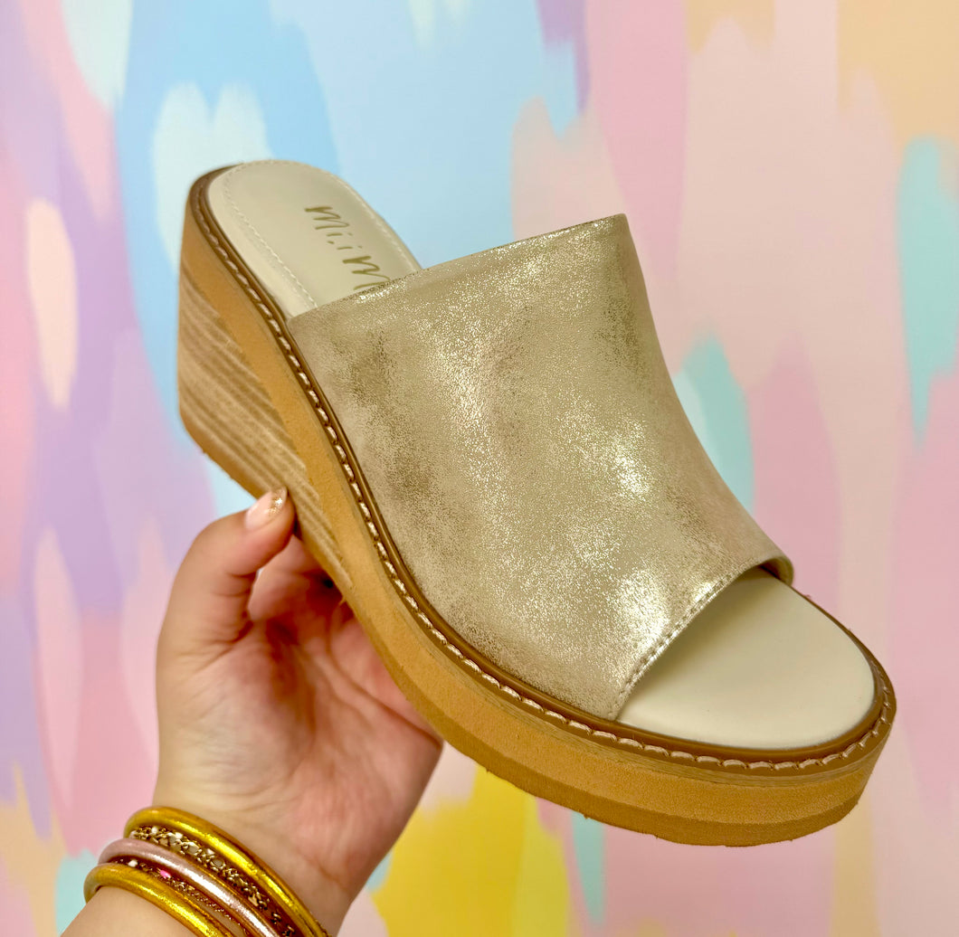 Gold platform heels