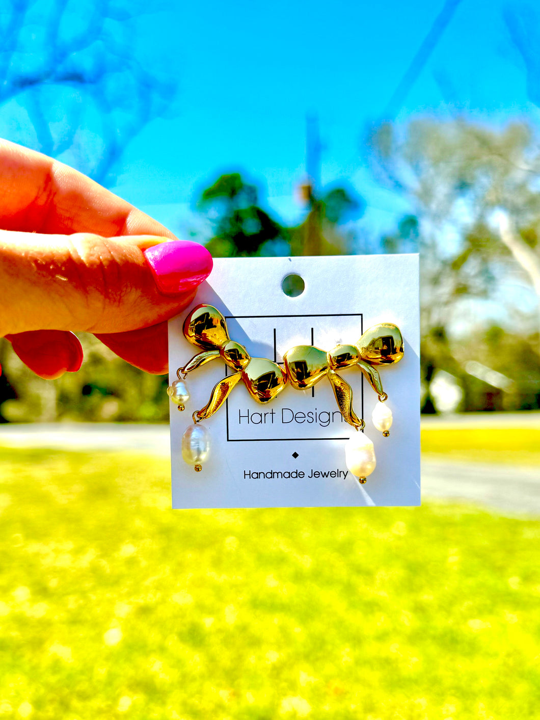 Pearl gold bow earrings- hart designs