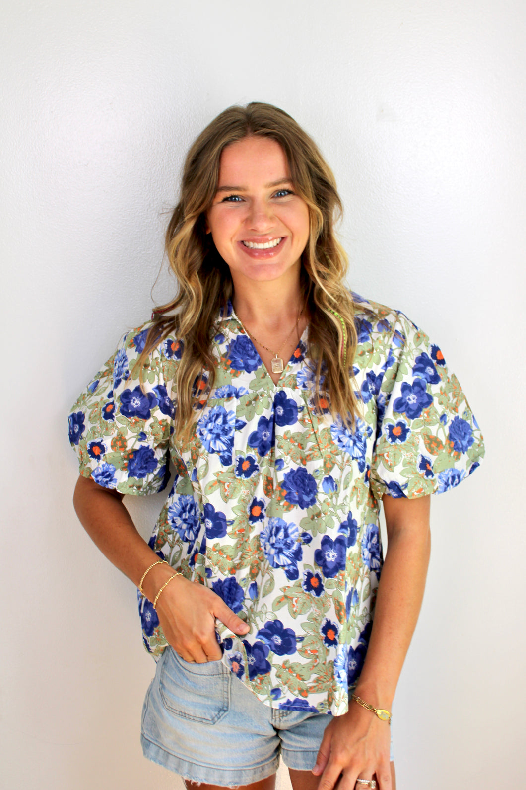 Blue floral printed puff sleeve top