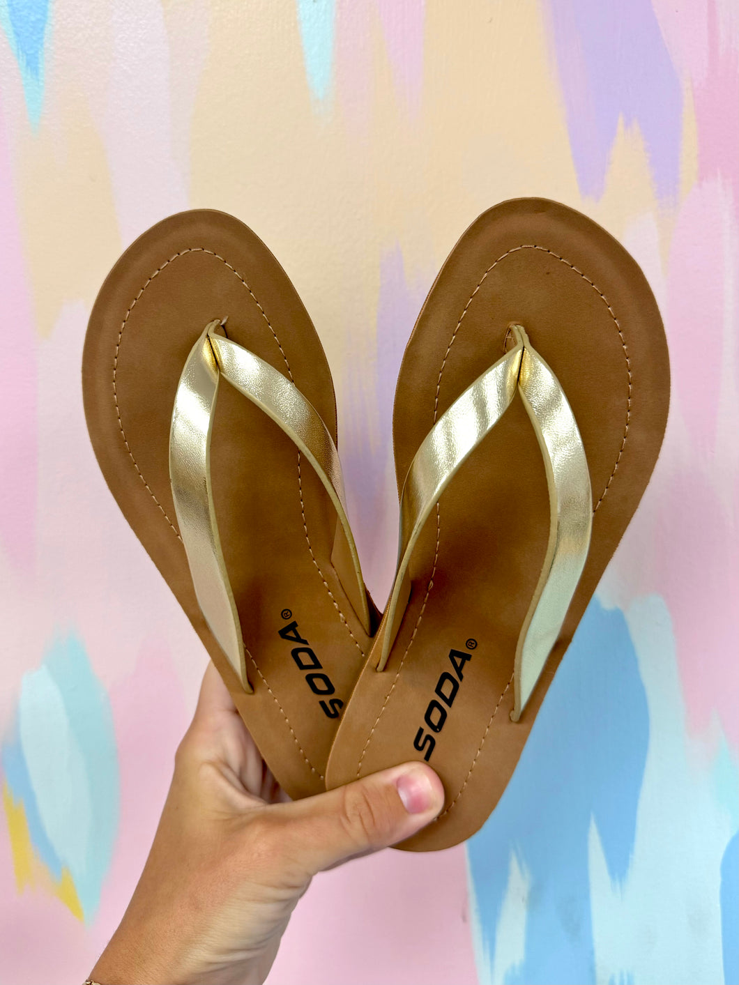 Gold flip flops