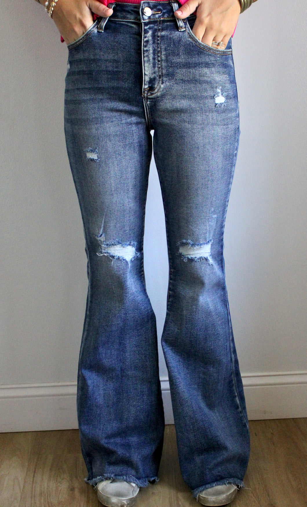 High rise knee distressed flare risen jeans