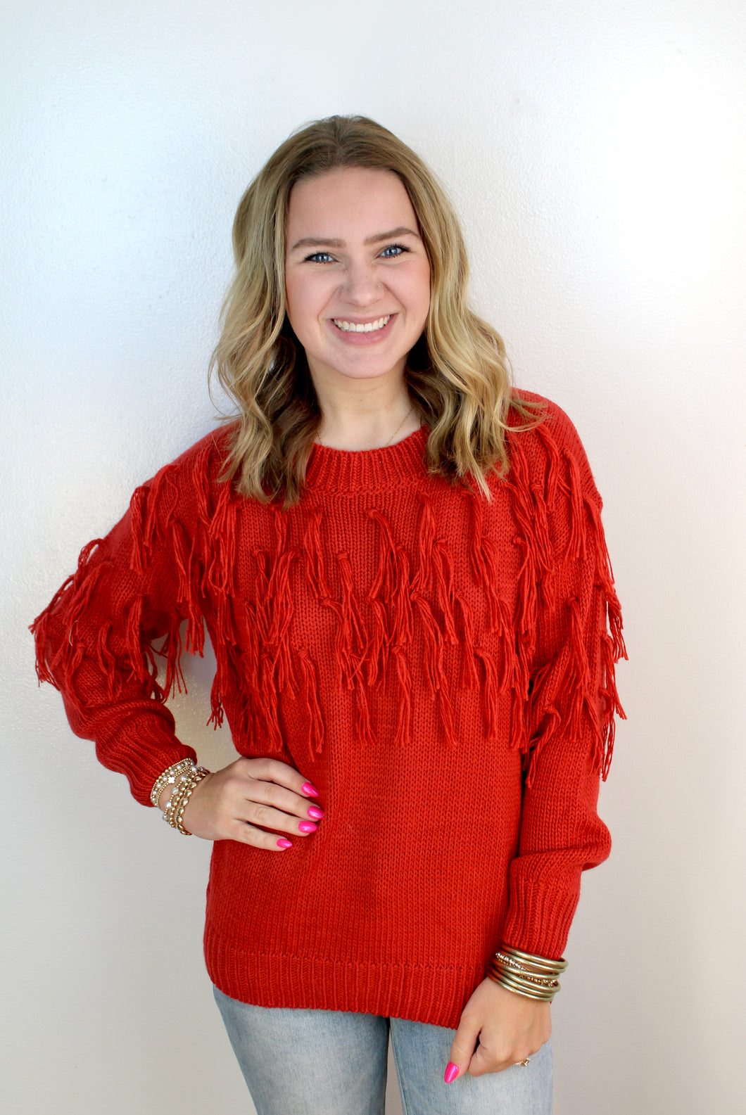 Rust fringe sweater