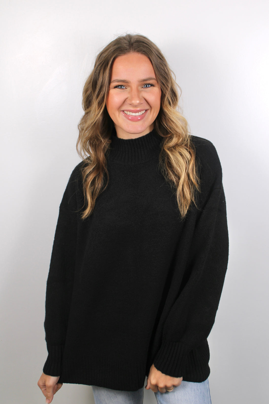 Black mock neck sweater