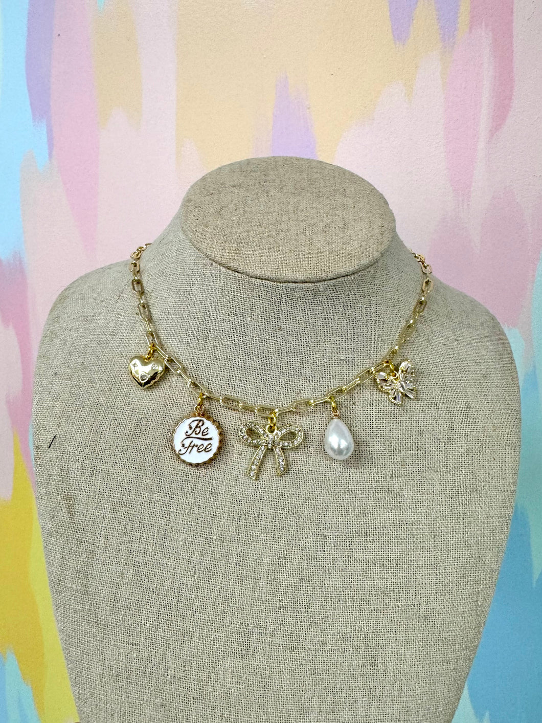 Bow be free charm necklace
