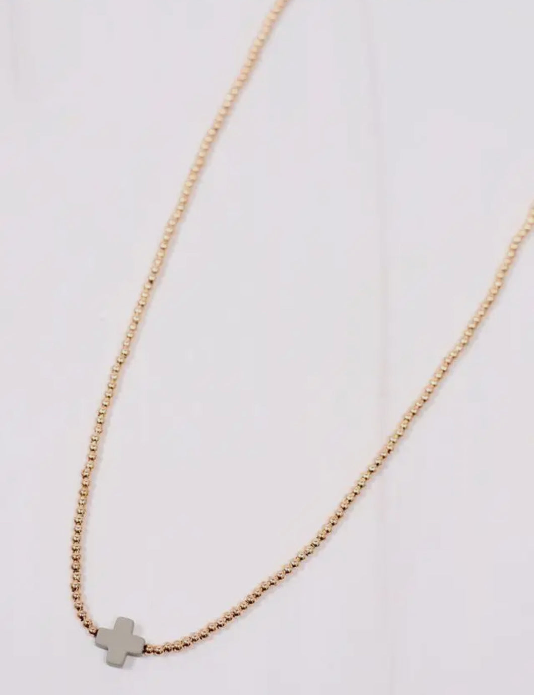 Grey cross necklace