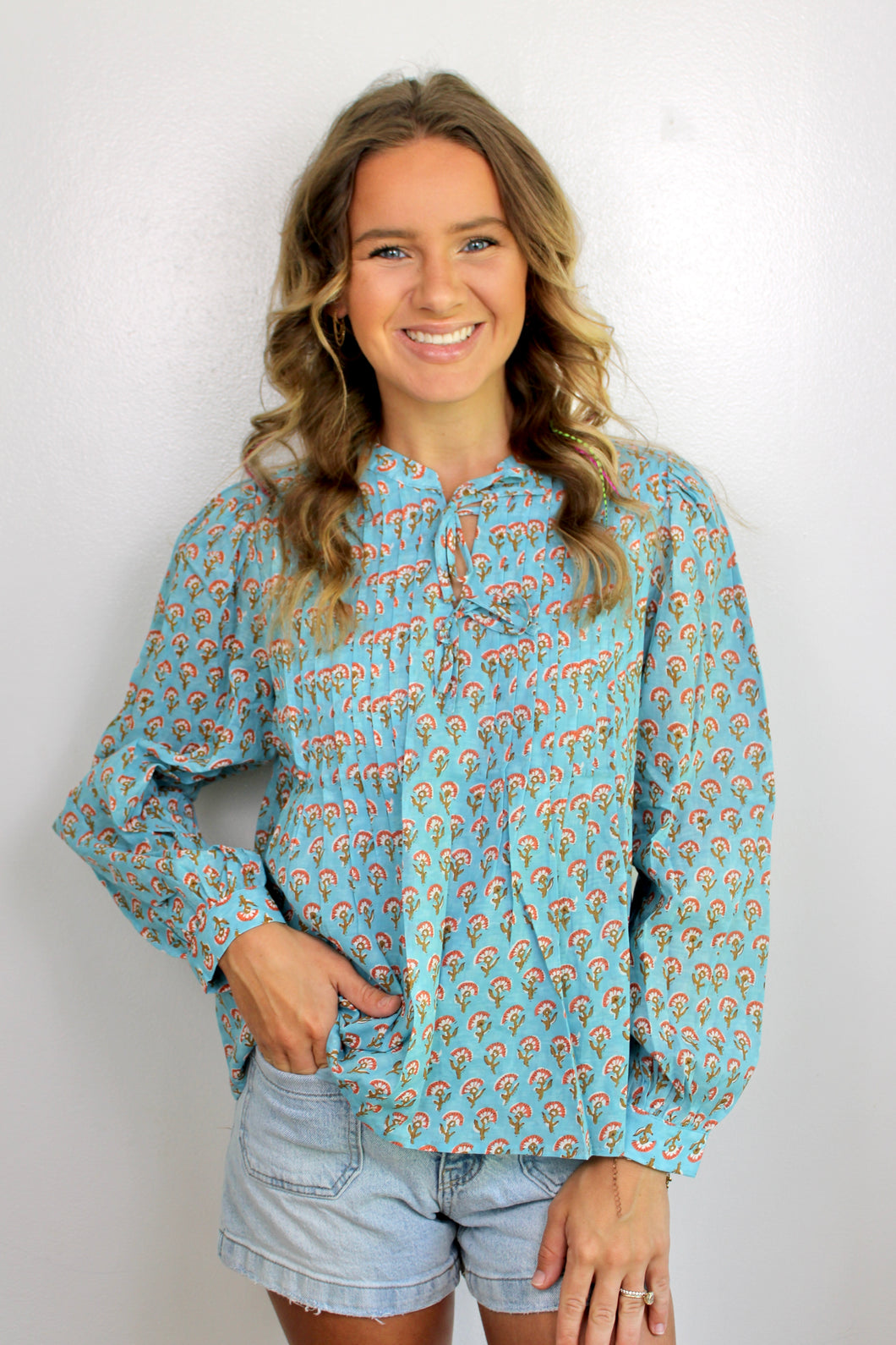 Floral printed blue top