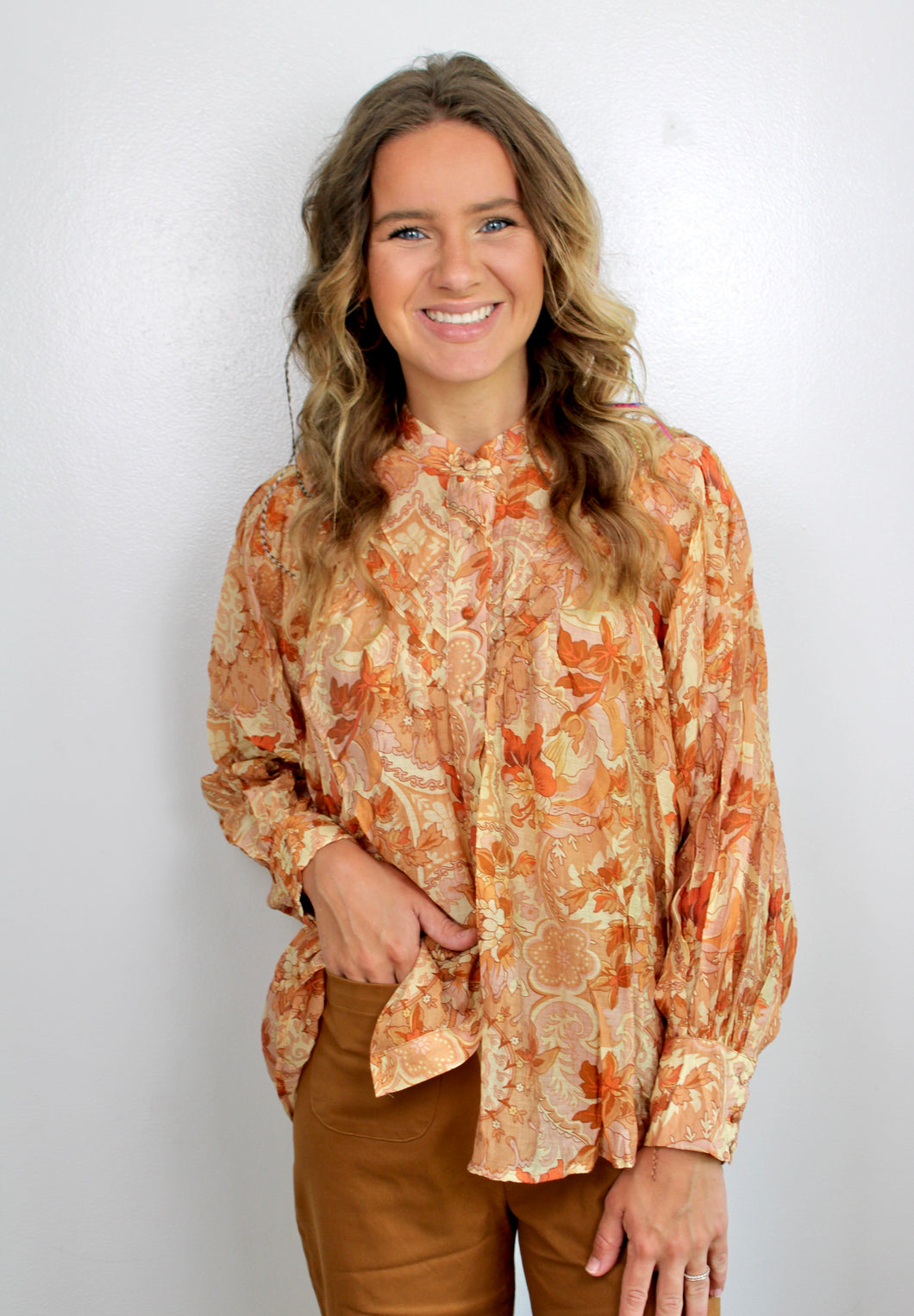 Golden peach floral button top