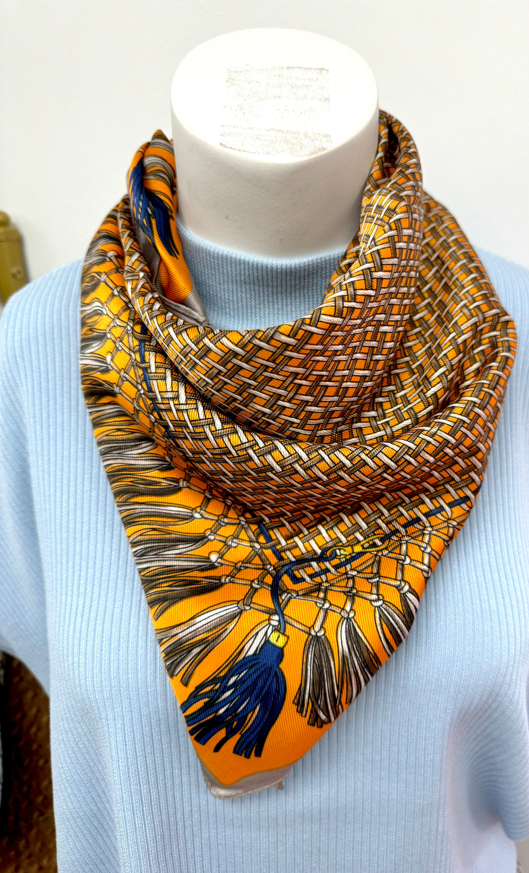 Orange tassel neck scarf