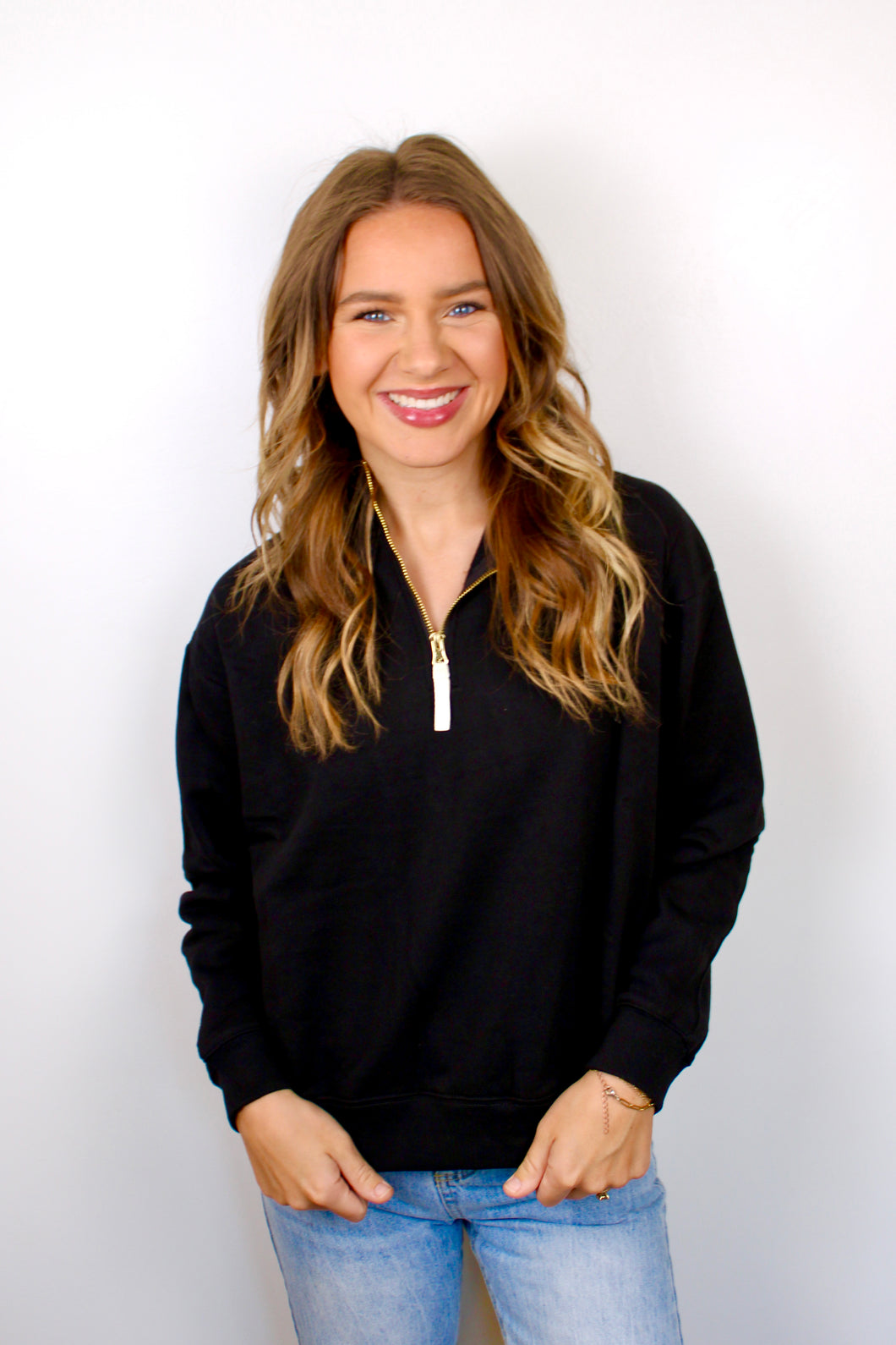 Black gold zipper pullover