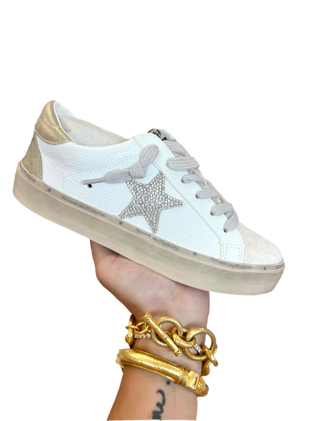 White gold star sneakers