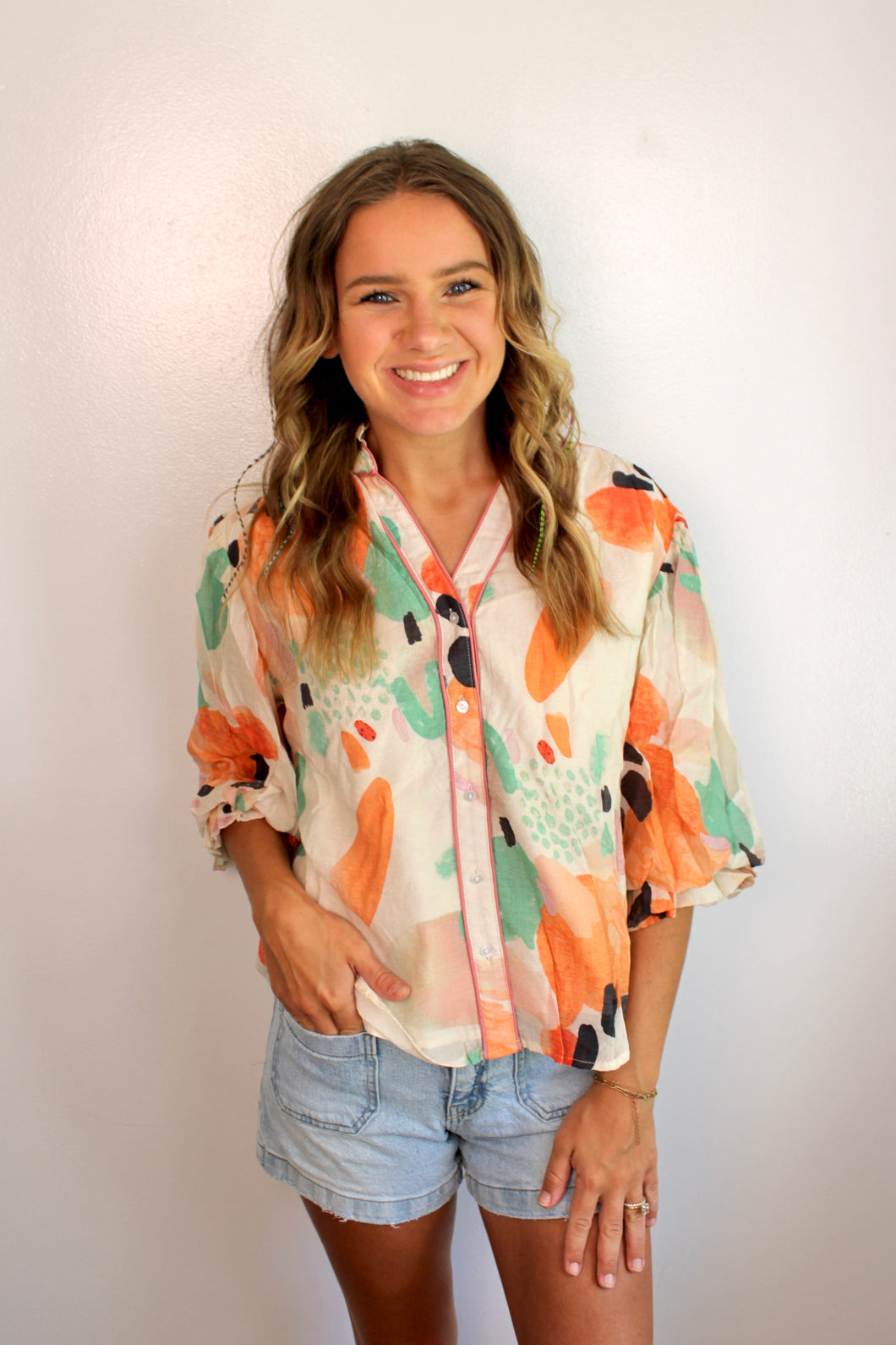 Abstract printed button down top