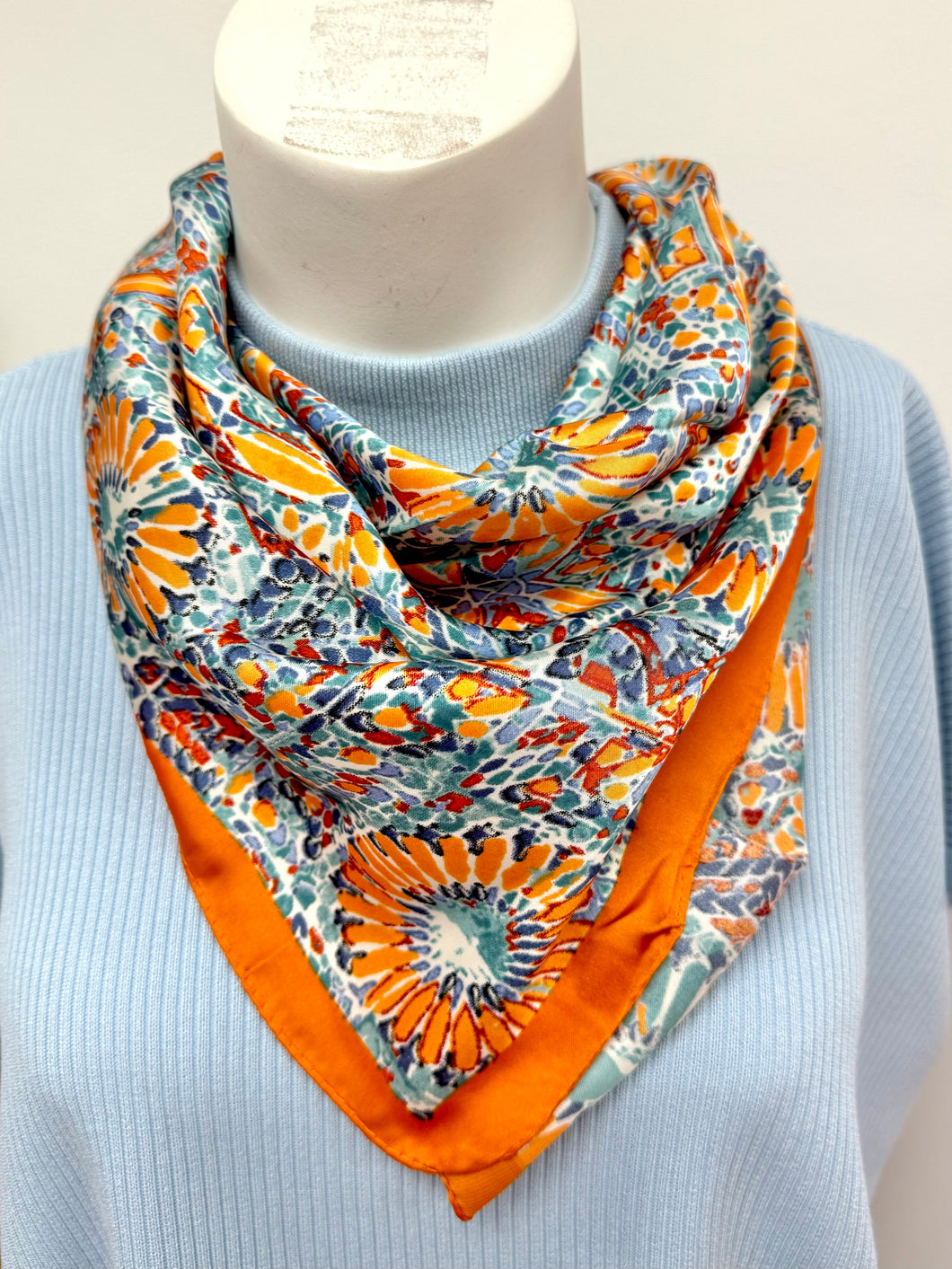 Orange color neck scarf