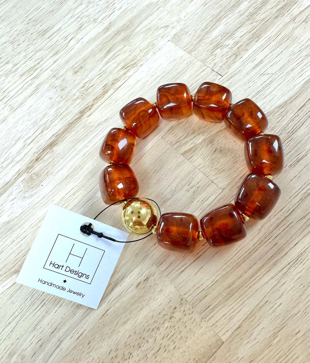 Brown gold hart designs bracelet