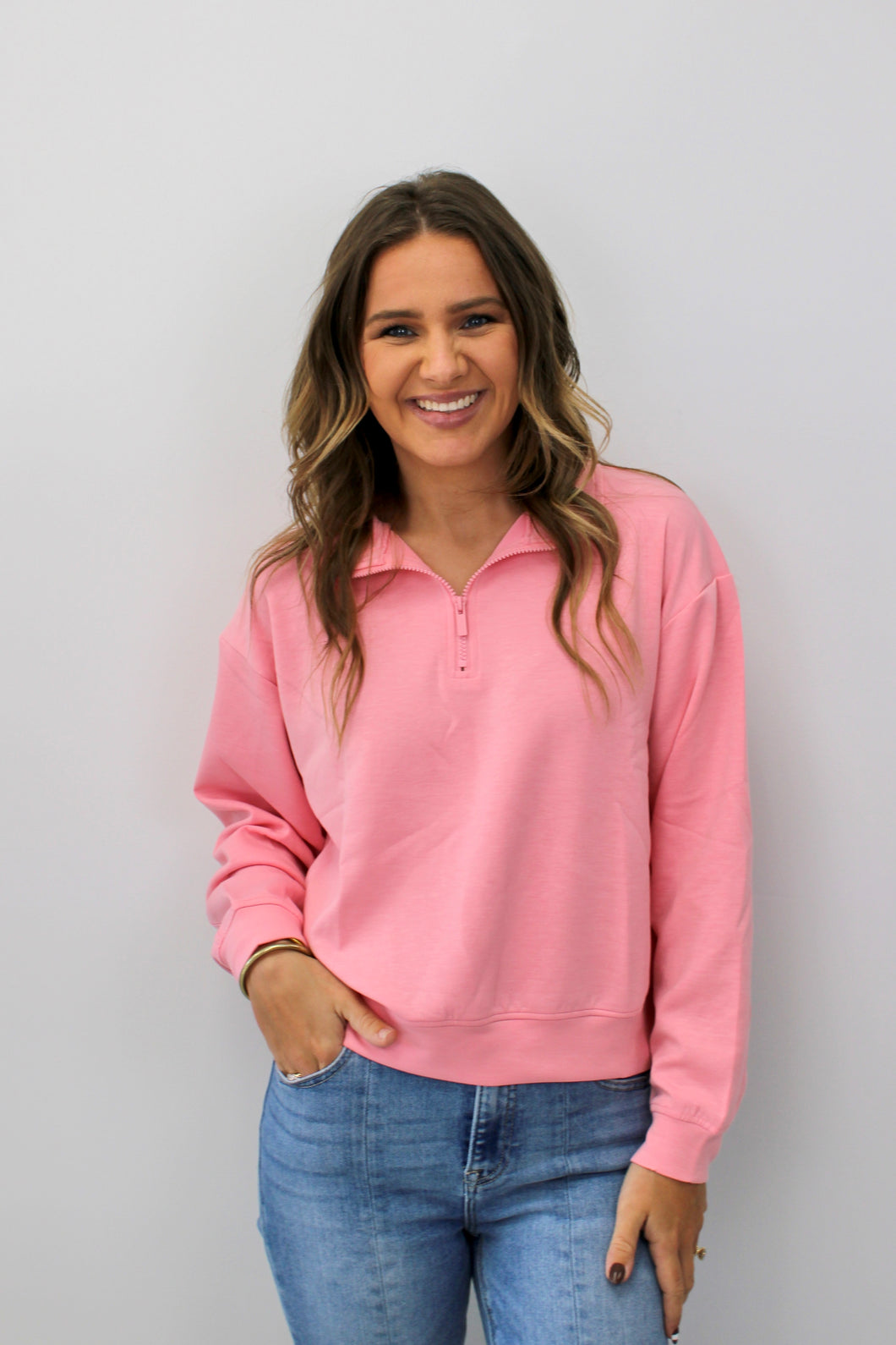 Bright pink zip pullover
