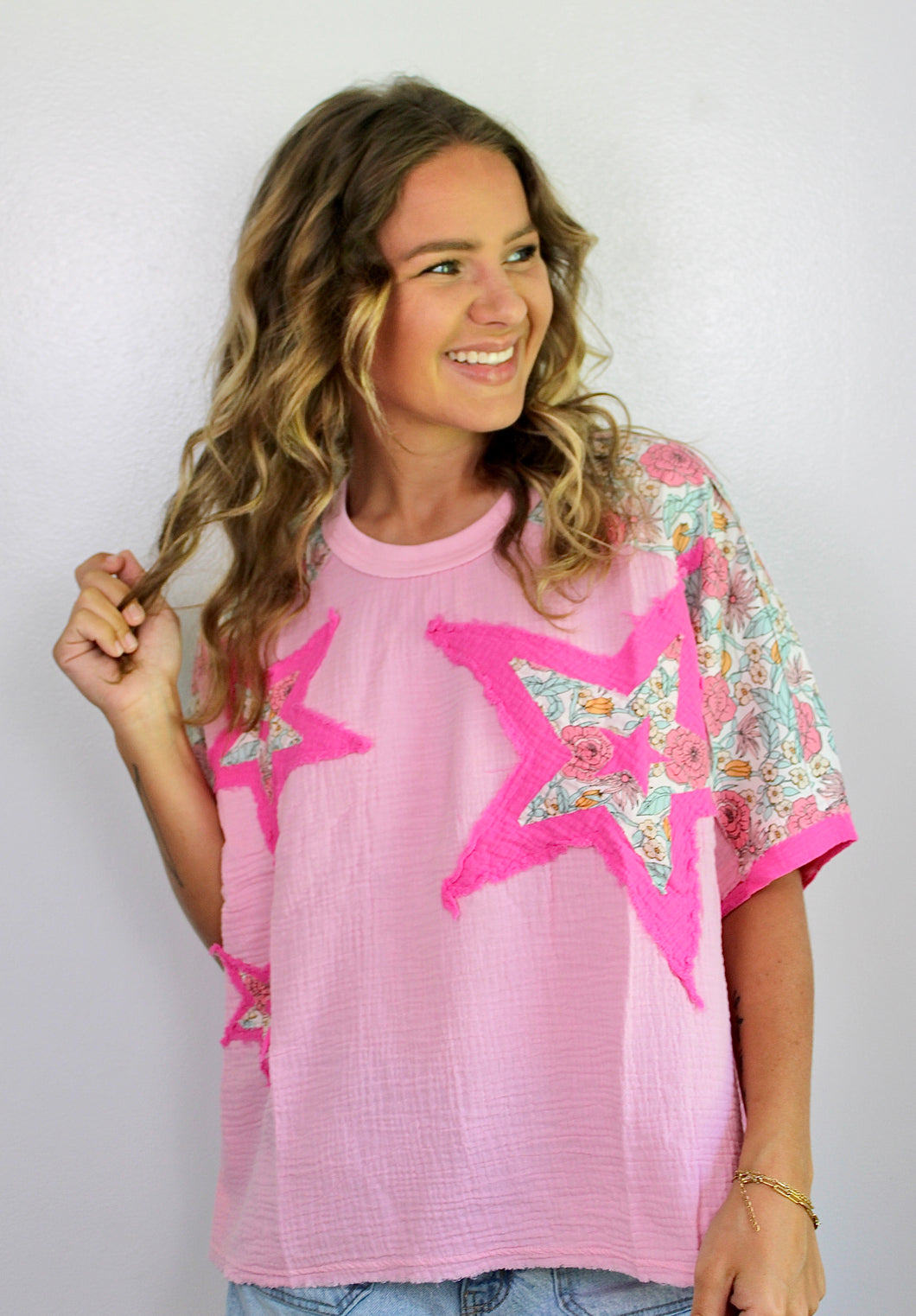 Pink gauze star top