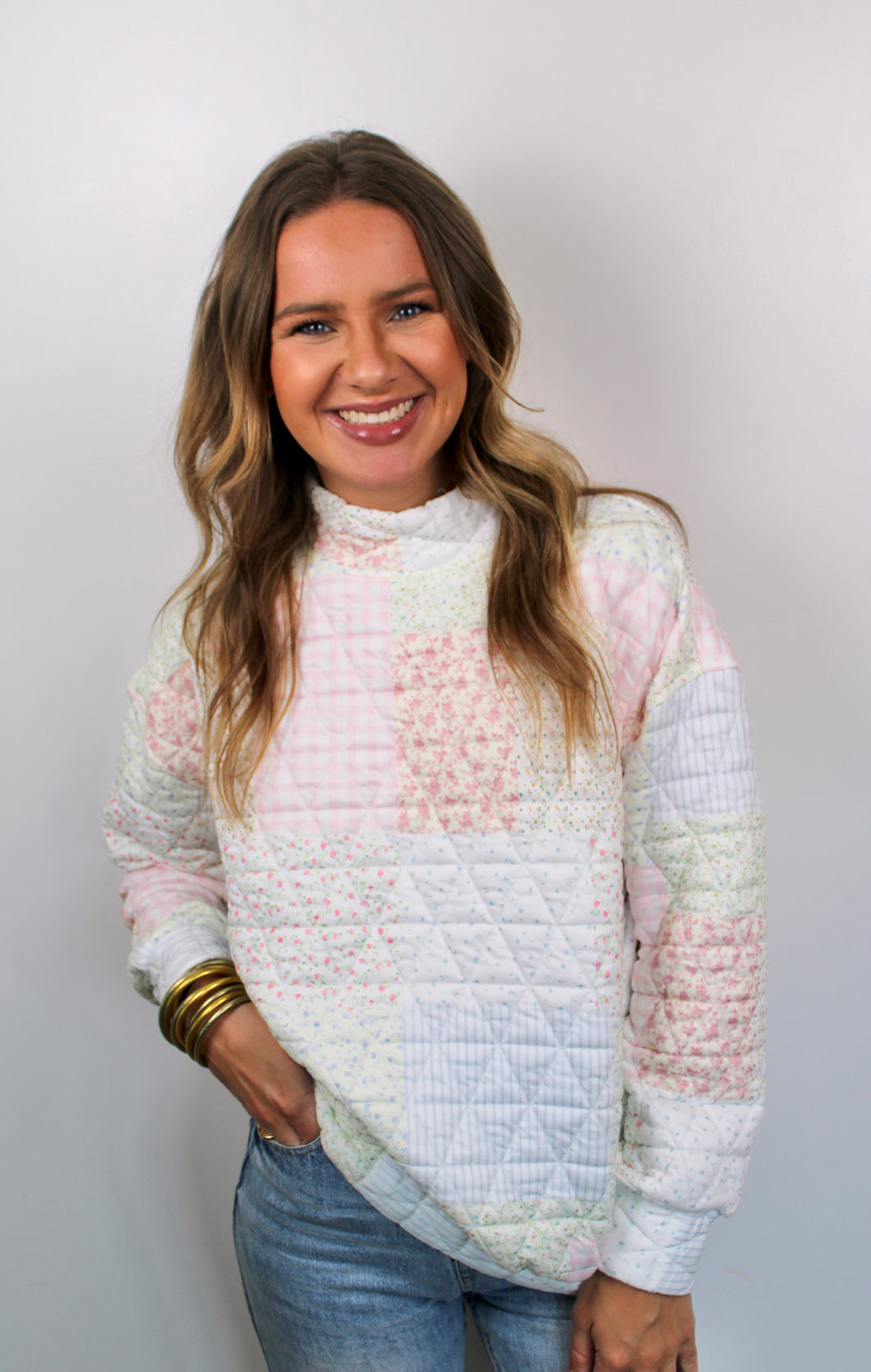 Floral textured mock neck pullover