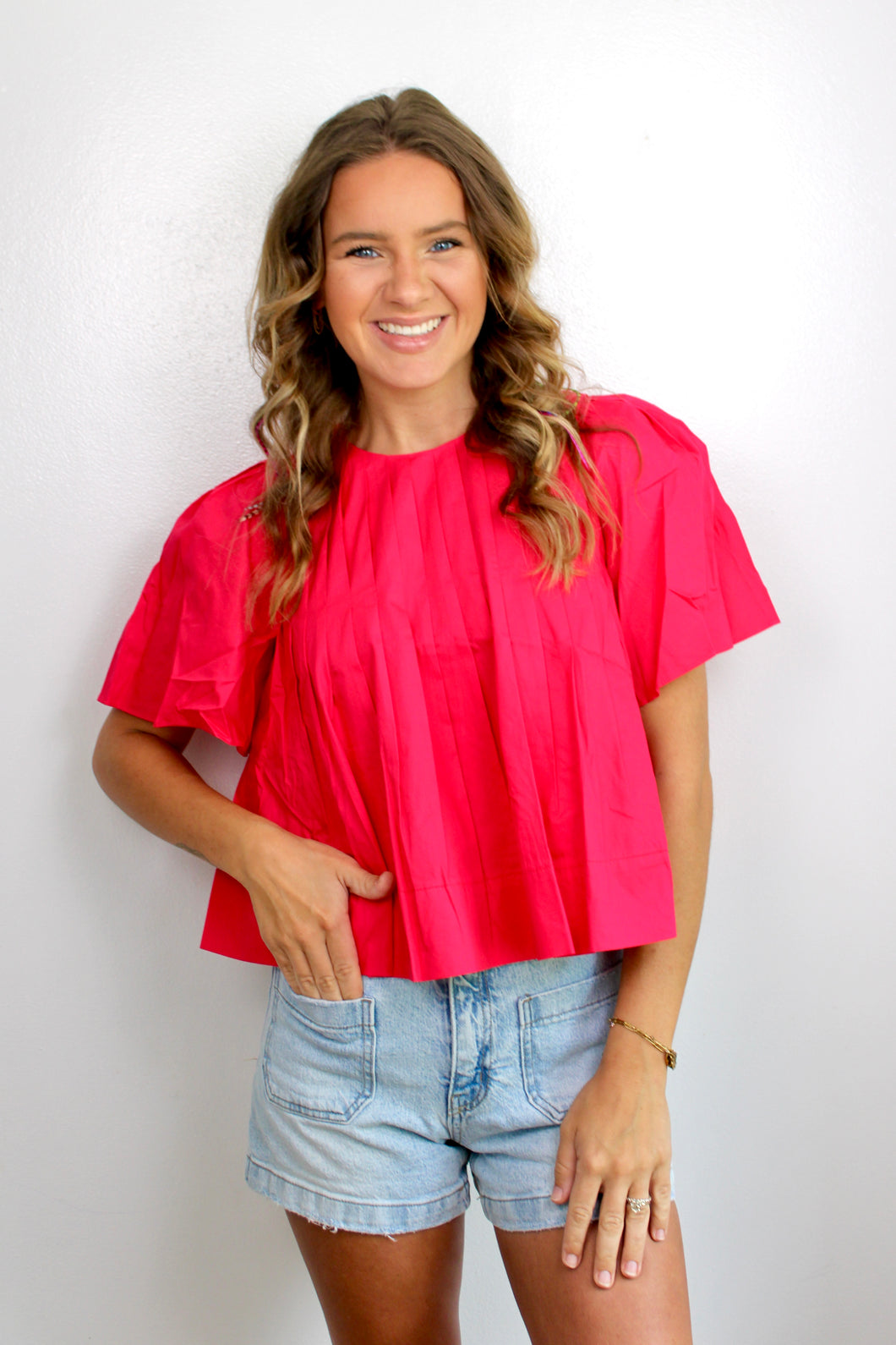 Pink pleated top