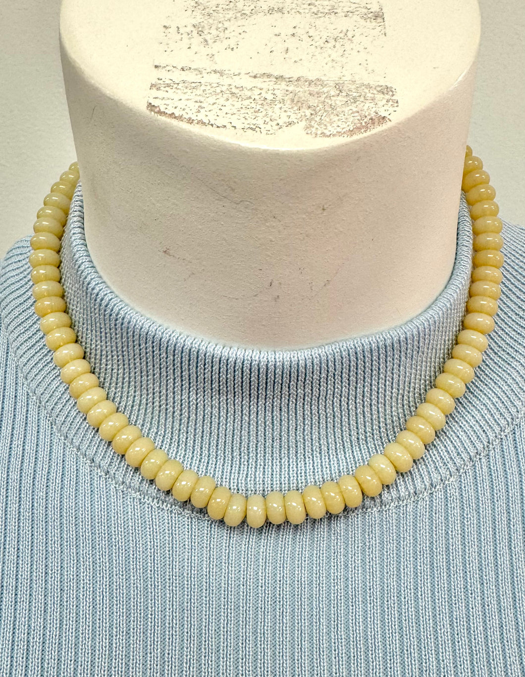 Light tan beaded hart designs necklace