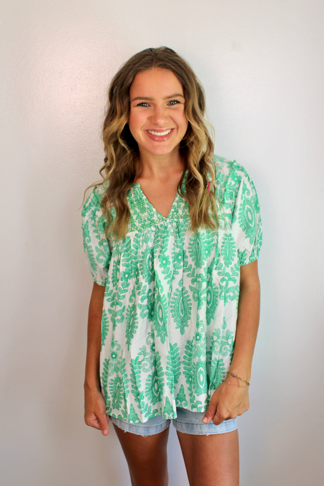 Green floral v neck top