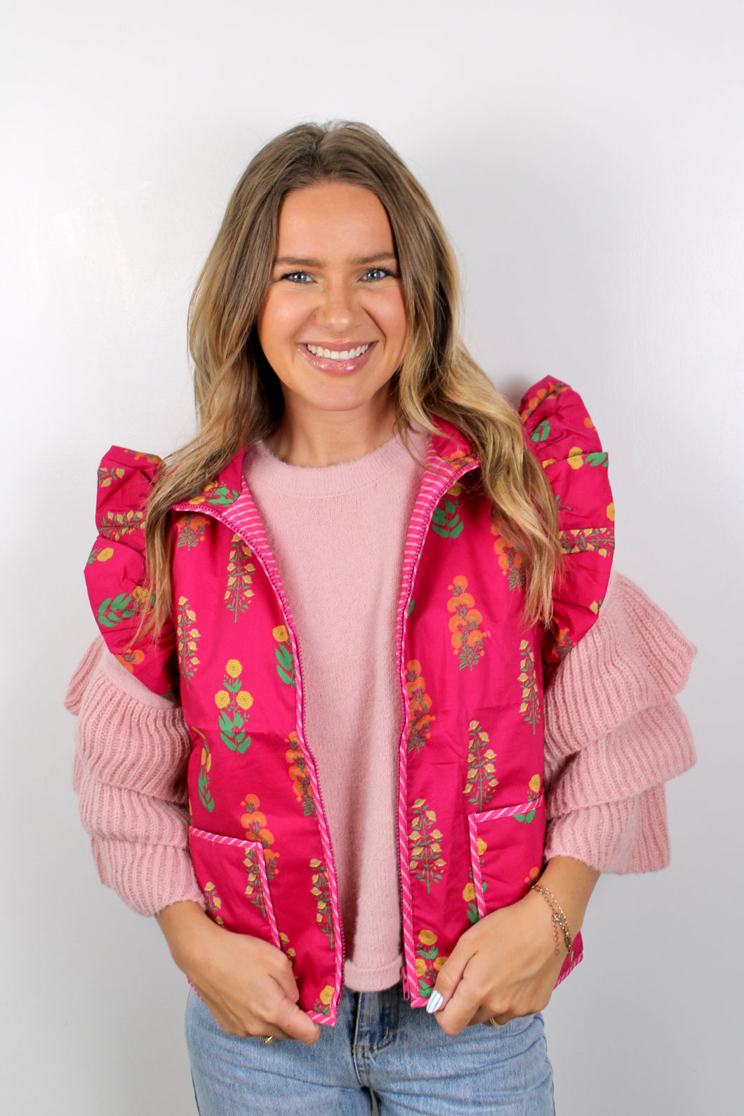 Floral pink puff vest