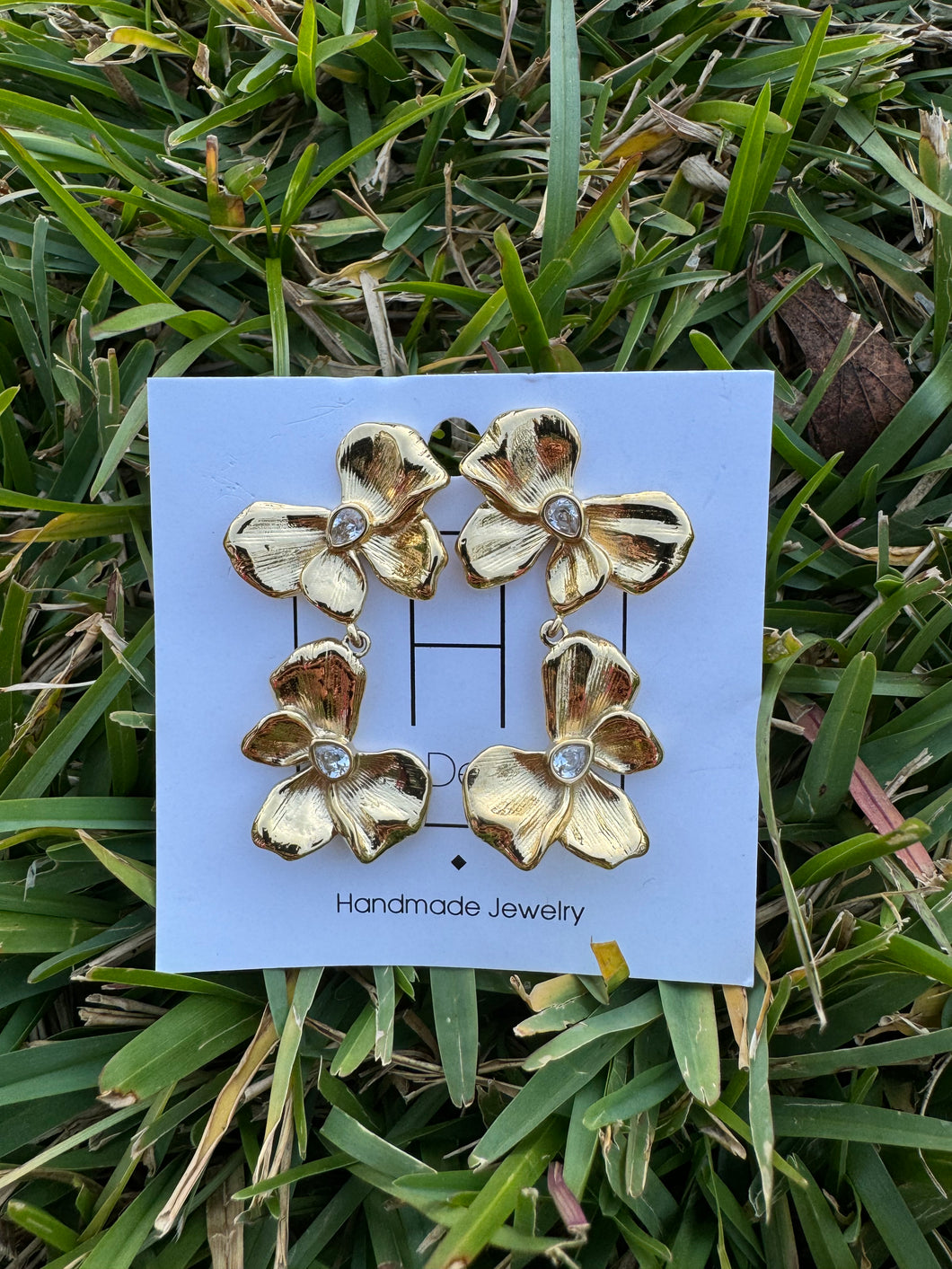 Gold bow hart designs earrings