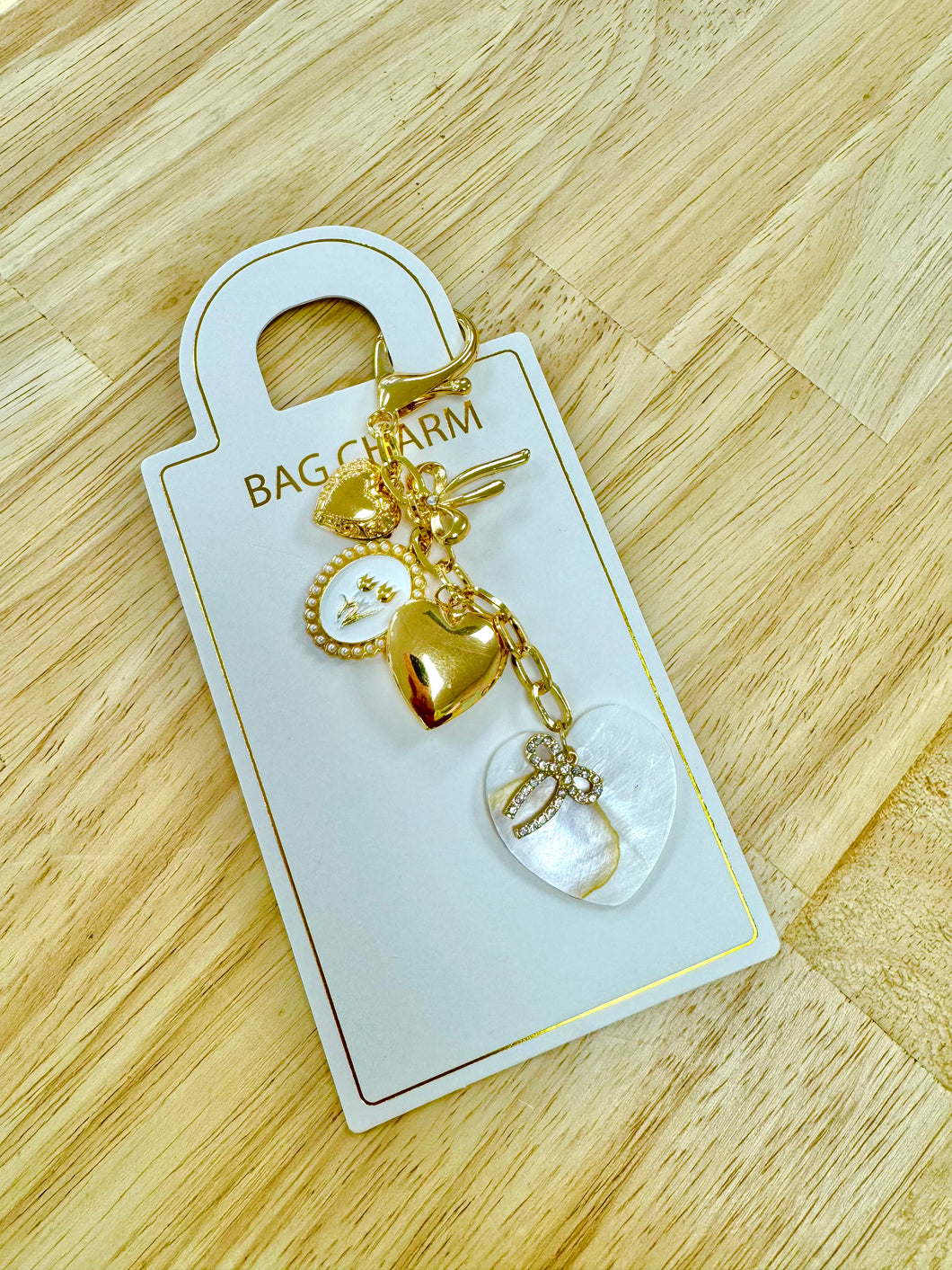 Hearts of gold bag charm