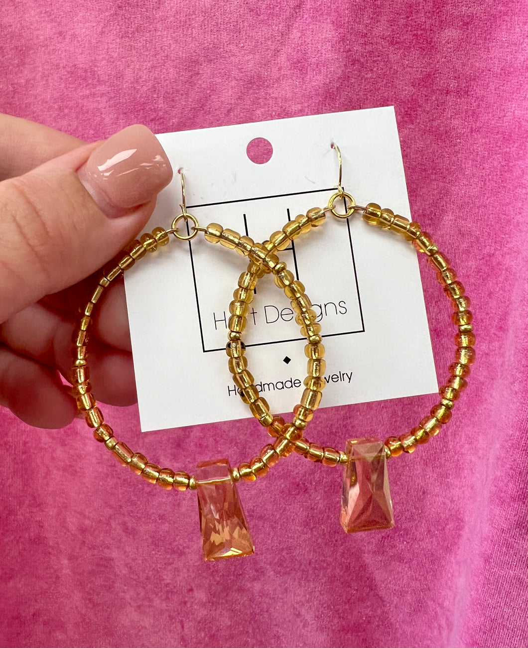 Gold beaded hart design earrings