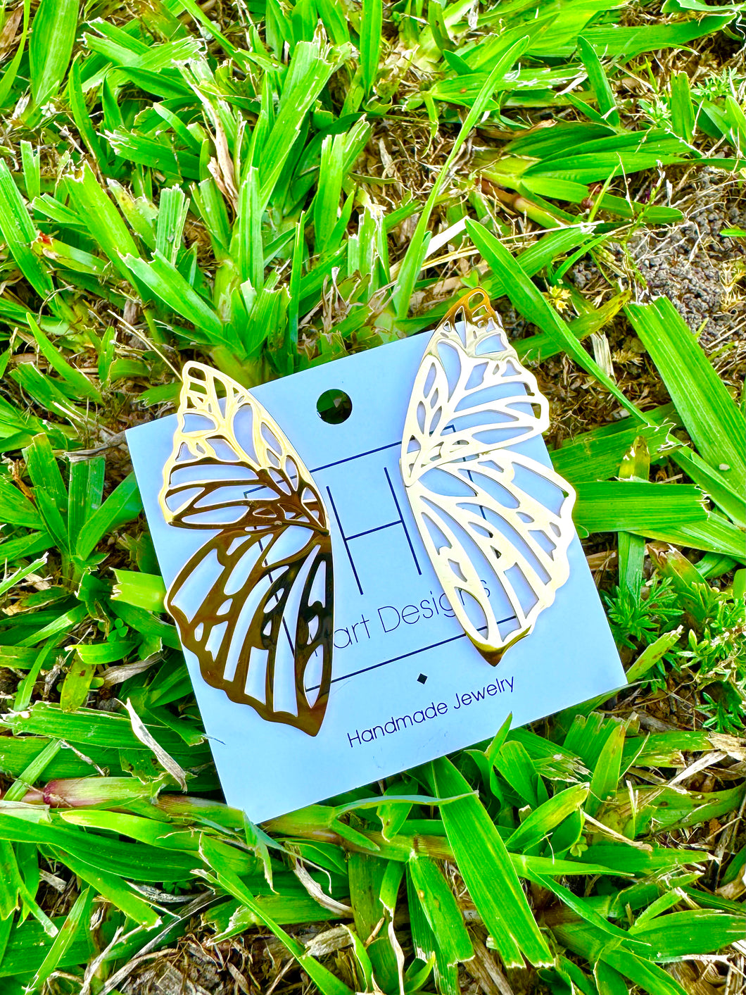 Gold butterfly hart designs earrings