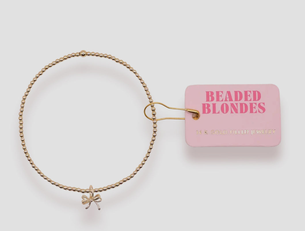 Charm bow bracelet- beaded blondes