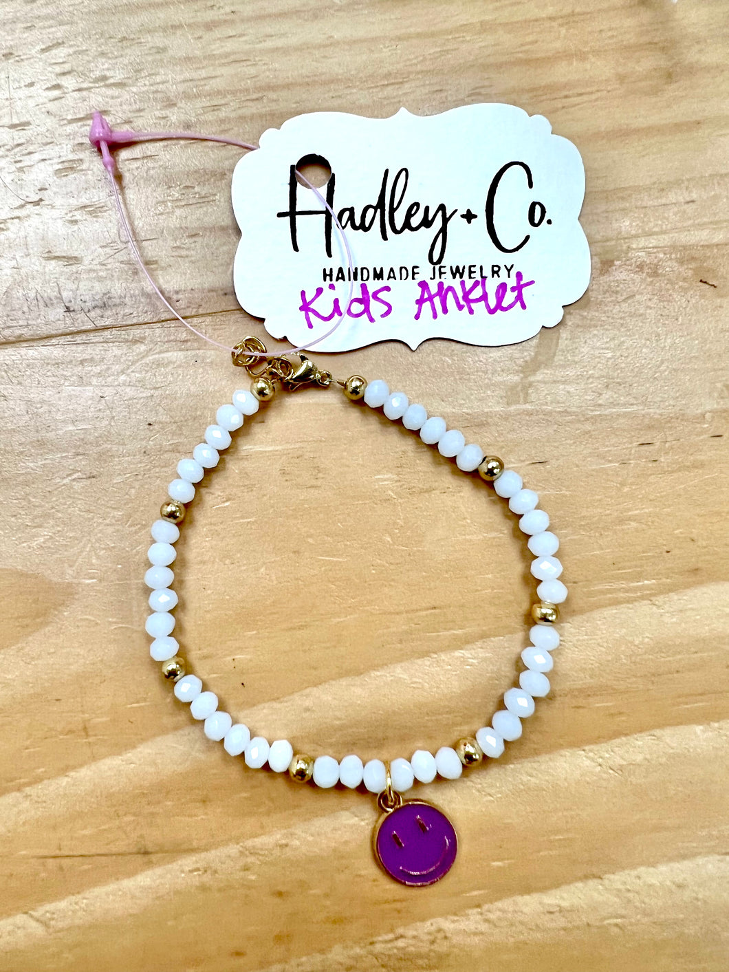 White beaded purple smiley Hadley + co anklet