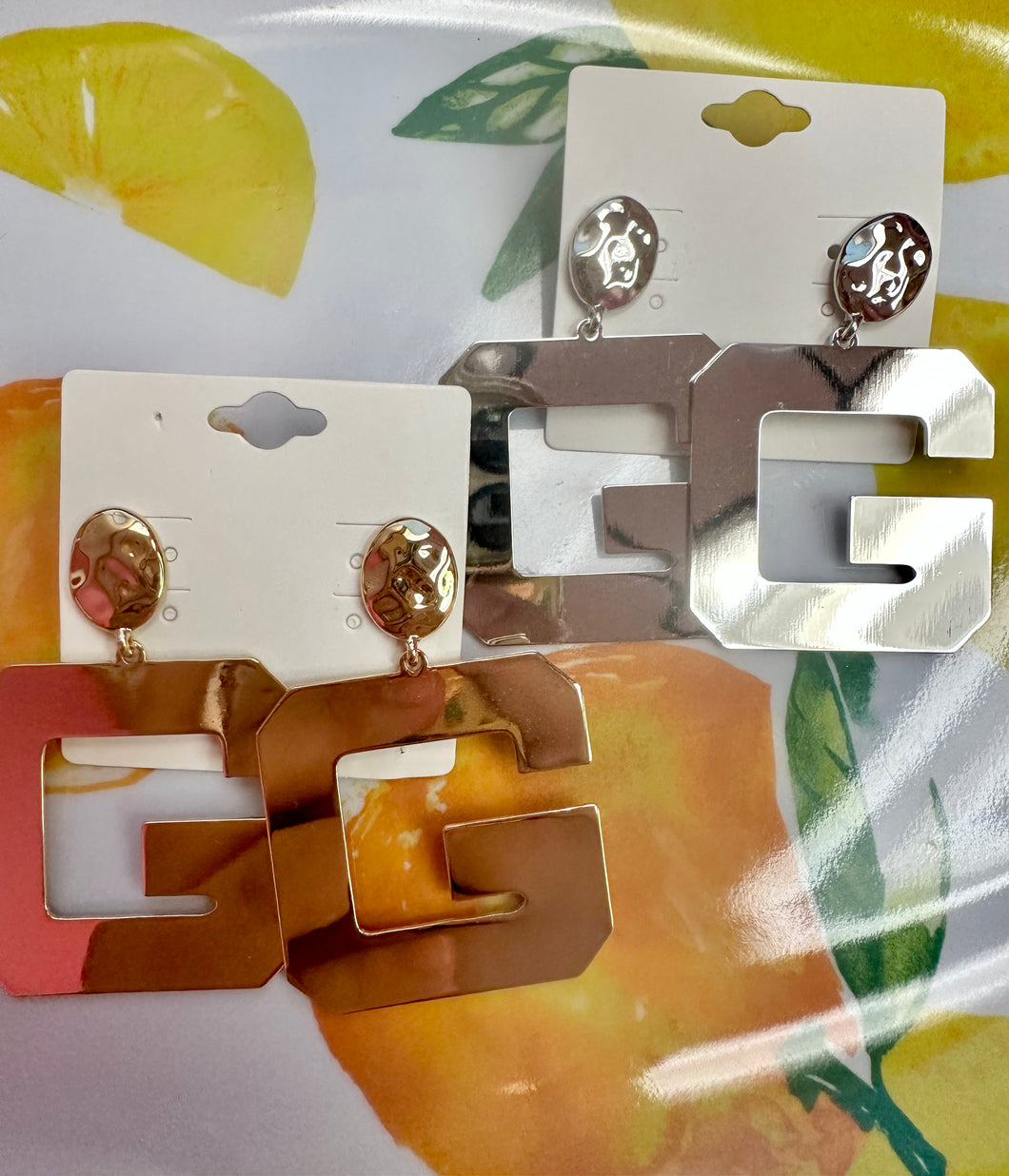 Metal G earrings