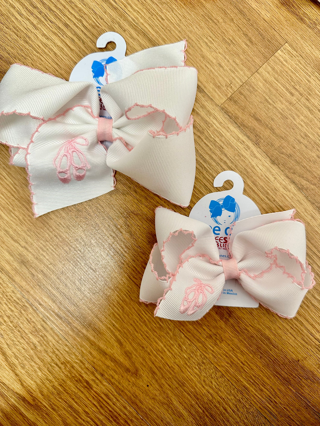 White & pink ballet bow