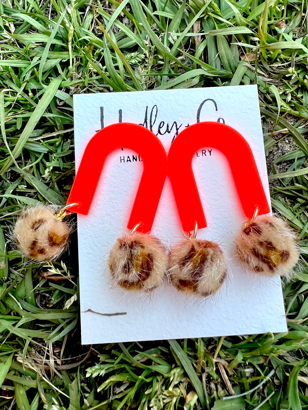 Orange leopard pom Hadley + co earrings